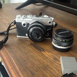 Olympus PEN F mirrorless interchangeable lens with accessories